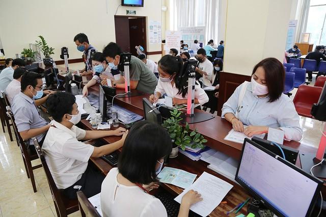 Tiếp tục đổi mới, sắp xếp tổ chức bộ máy của hệ thống chính trị tinh gọn, hiệu quả - Ảnh 1.