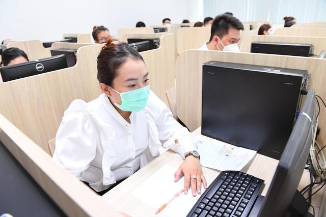 Bộ Nội vụ tổ chức thi nâng ngạch công chức, thăng hạng chức danh nghề nghiệp viên chức - Ảnh 1.