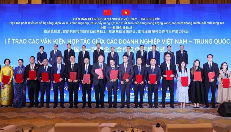 Thủ tướng: Cộng đồng doanh nghiệp là trụ cột quan trọng kết nối kinh tế Việt Nam – Trung Quốc- Ảnh 12. Thủ tướng: Cộng đồng doanh nghiệp là trụ cột quan trọng kết nối kinh tế Việt Nam – Trung Quốc- Ảnh 12.