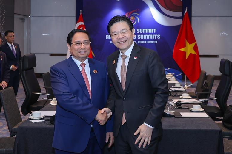 Thủ tướng đề nghị Singapore hỗ trợ phát triển một số ngành công nghiệp chiến lược- Ảnh 1. Thủ tướng đề nghị Singapore hỗ trợ phát triển một số ngành công nghiệp chiến lược- Ảnh 1.