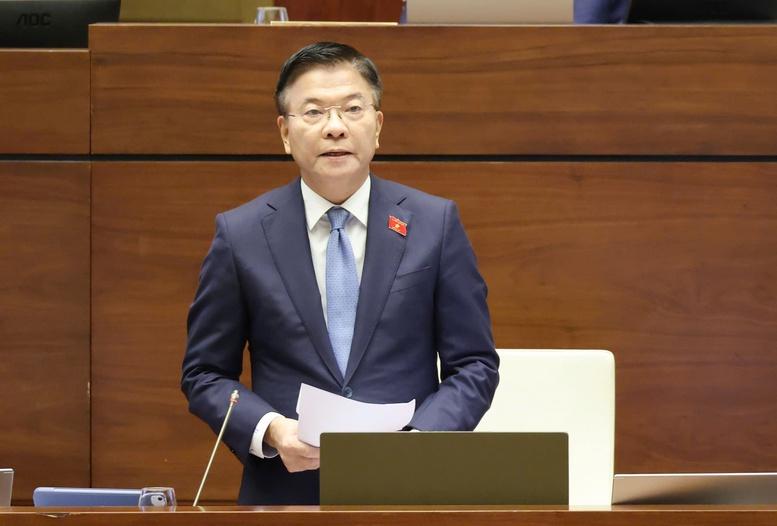 Phó Thủ tướng Lê Thành Long làm rõ một số vấn đề kinh tế - xã hội trước Quốc hội- Ảnh 1.