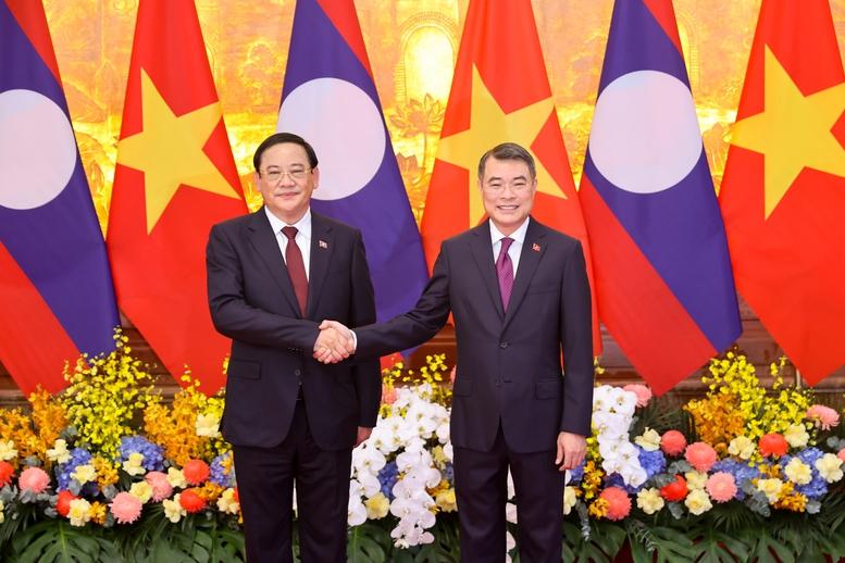 Việt Nam luôn kề vai sát cánh hỗ trợ Lào hiện thực hoá các mục tiêu chiến lược đã đề ra- Ảnh 1.