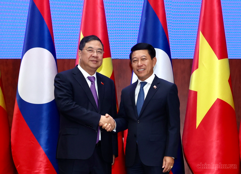 Phó Thủ tướng Thường trực Phạm Gia Túc hội đàm, thúc đẩy gắn kết chiến lược Việt Nam-Lào- Ảnh 1.